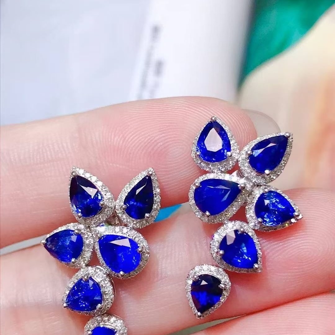 14k Gold 6.37 Ctw Vivid Blue Natural Sapphire & Diamond Earrings: Ref:231040238 // gold content:14k gold // main gemstone:sapphire // shape:pear // carat weight:5. 7ct // color:vivid blue // treatment:natural // // adjacent gemstone 2 : diamond // shape:round // car