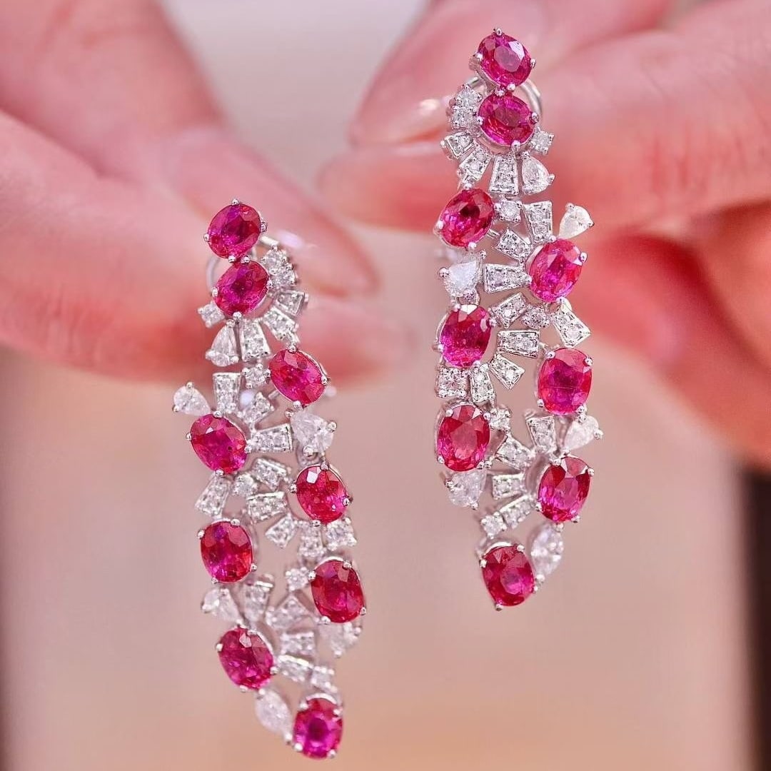 14k Gold 5.5 Ctw Natural Ruby & Diamond Earrings: Ref:231040272 // gold content:14k gold // main gemstone:ruby // shape:oval // carat weight:4. 5ct // color:red // treatment:natural // // adjacent gemstone 2 : diamond // shape:multiply // carat weigh