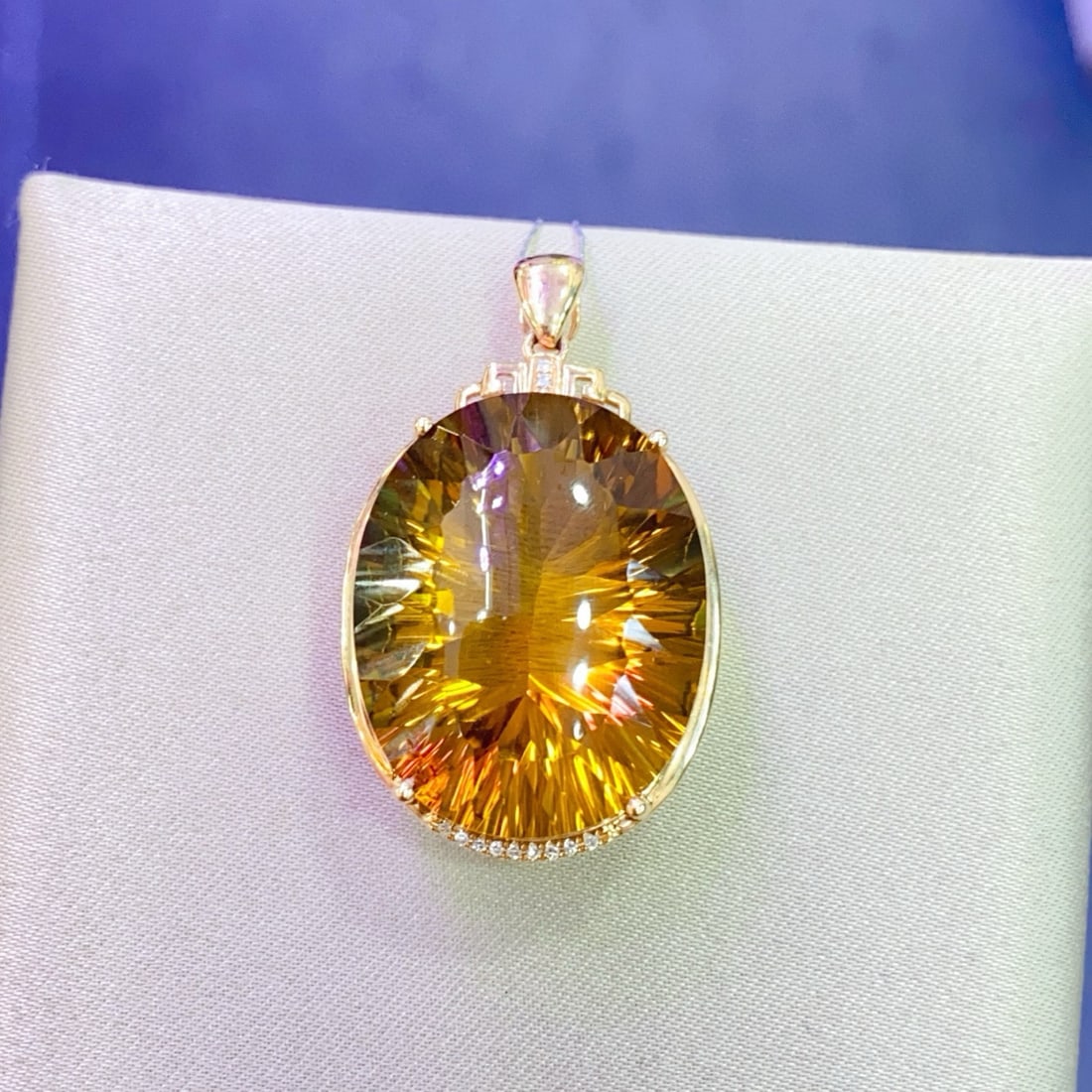 14k Gold 25.38 Ctw Natural Citrine & Diamond Pendant( Without Chain ): Ref:231040281 // gold content:14k gold // main gemstone:citrine // shape:oval // carat weight:25. 35ct // color:yellow // treatment:natural // // adjacent gemstone 2 : diamond // number of stones:12