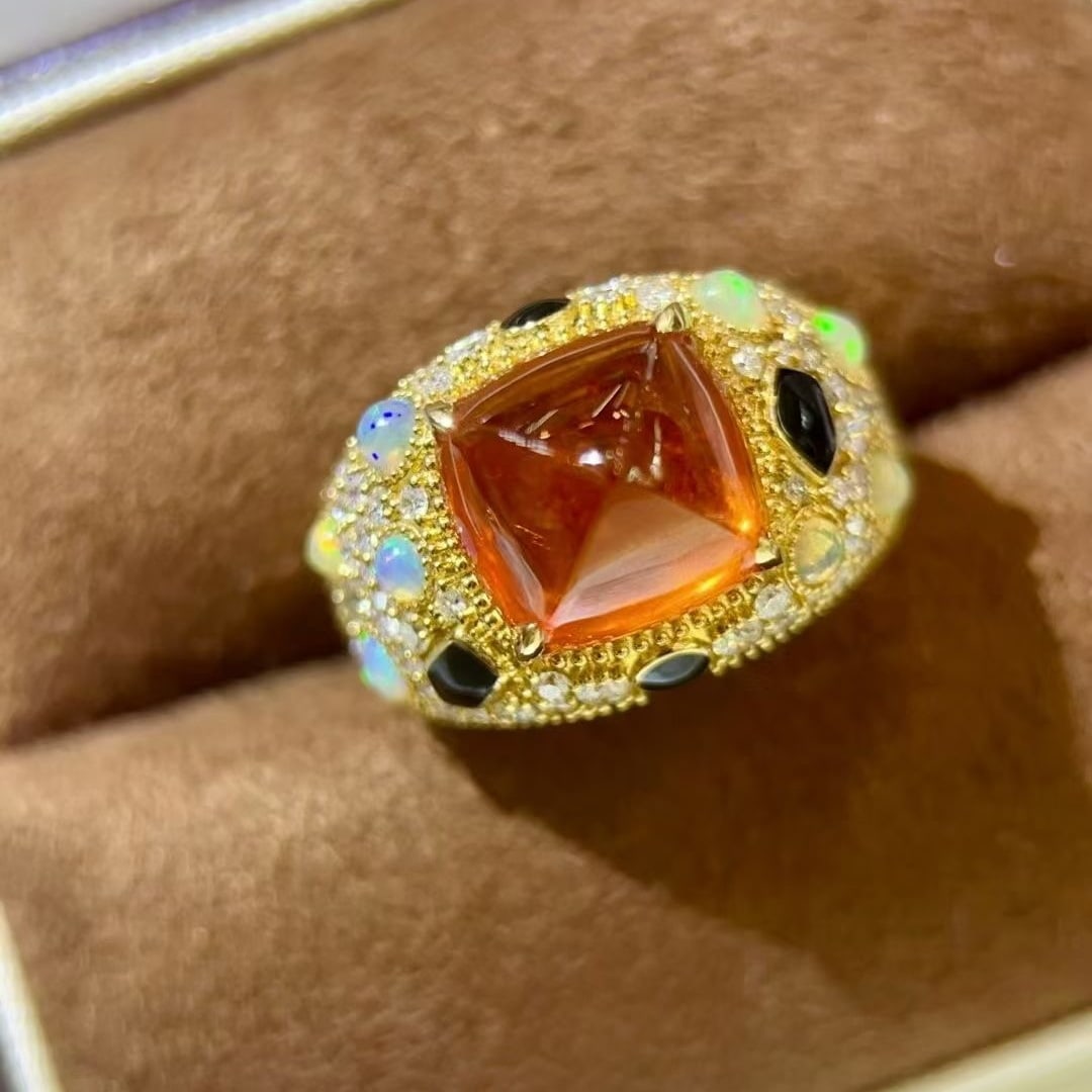 14k Gold 9.25 Ctw Natural Spessartine & Diamond Ring: Ref:231040291 // gold content:14k gold // ring size:7. 25us // // main gemstone:spessartine // shape:suger-loaf // carat weight:8. 43ct // color:orange // treatment:natural // // adjacent gemstone 2 :