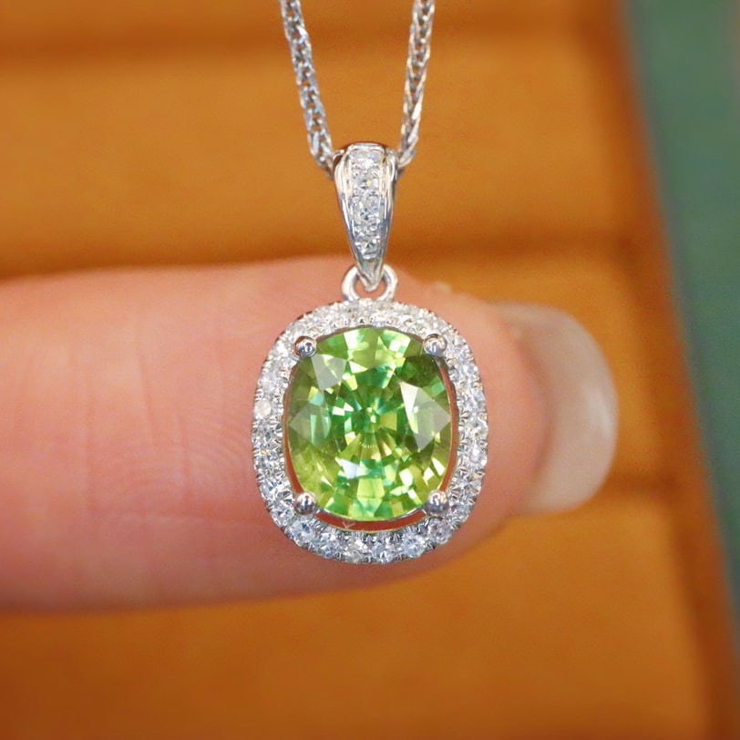 14k Gold 1.49 Ctw Natural Sapphire & Diamond Pendant( Without Chain ): Ref:231040315 // gold content:14k gold // main gemstone:sapphire // shape:oval // carat weight:1. 34ct // color:green // treatment:natural // // adjacent gemstone 2 : diamond // number of stones:30