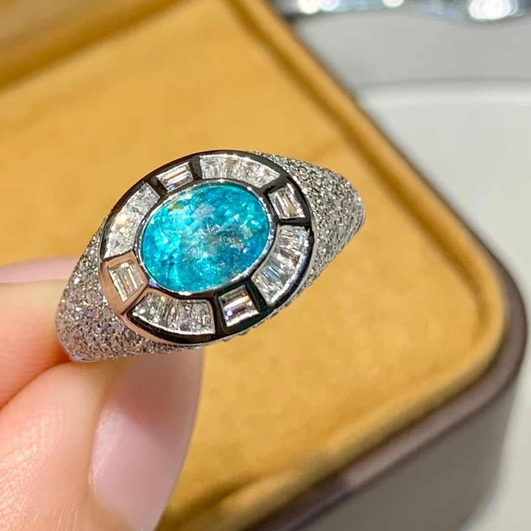 14k Gold 1.2 Ct Natural Paraiba Tourmaline & Diamond Ring: Ref:231040330 // gold content:14k gold // ring size:7. 25us // // main gemstone:paraiba tourmaline // shape:oval // carat weight:1. 2ct // color:blue // treatment:natural // // adjacent gemstone 2 :