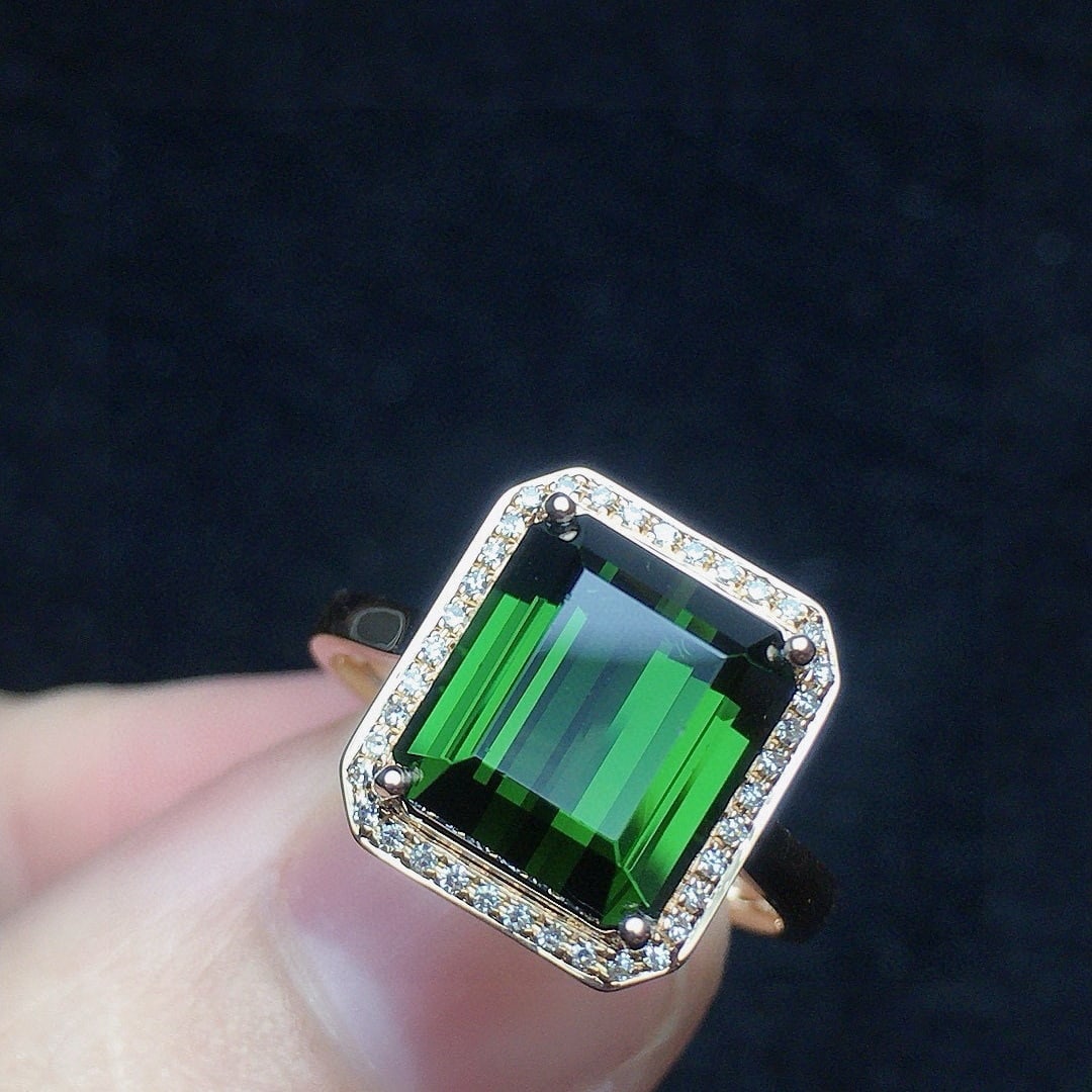 14k Gold 4.56 Ct Natural Tourmaline & Diamond Ring: Ref:231040337 // gold content:14k gold // ring size:7. 25us // // main gemstone:tourmaline // shape:octagonal // carat weight:4. 56ct // color:green // treatment:natural // // adjacent gemstone 2 :