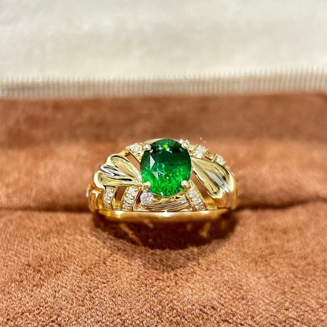 14k Gold 1.93 Ctw Vivid Green Natural Tsavorite & Diamond Ring: Ref:231040338 // gold content:14k gold // ring size:7. 25us // // main gemstone:tsavorite // shape:oval // carat weight:1. 72ct // color:vivid green // treatment:natural // // adjacent gemstone 2 :