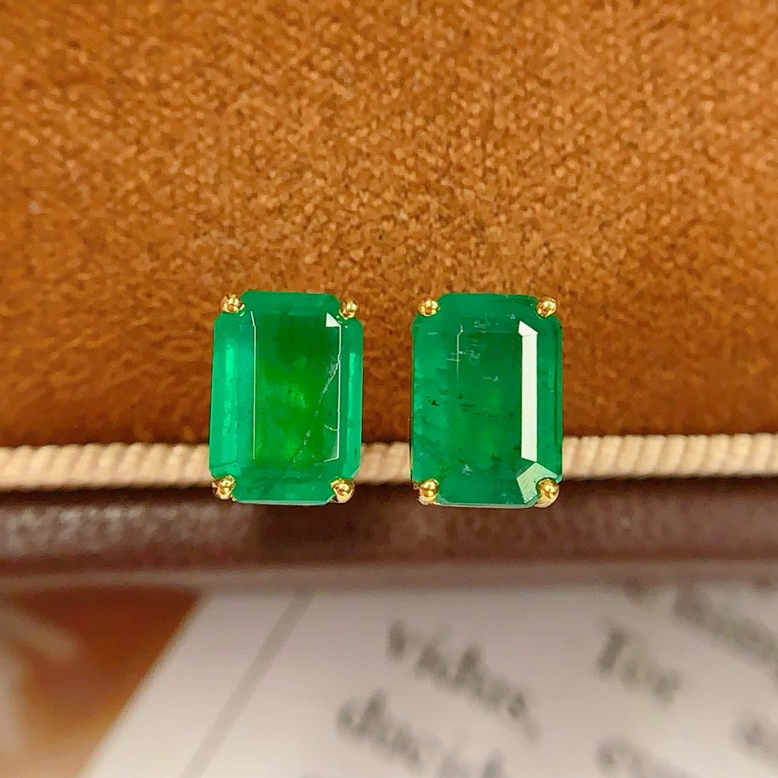 14k Gold 2.5 Ct Vivid Green Natural Emerald Earrings: Ref:231040362 // gold content:14k gold // main gemstone:emerald // shape:octagonal // carat weight:2. 5ct // color:vivid green // treatment:natural // Low Estimate: 3300 Condition: New High Estimate: