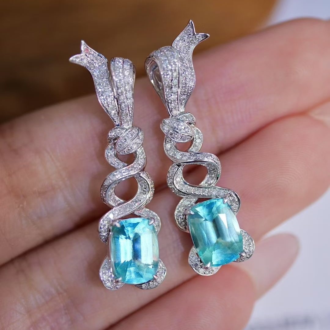 14k Gold 3.47 Ct Natural Paraiba Tourmaline & Diamond Earrings: Ref:231040385 // gold content:14k gold // main gemstone:paraiba tourmaline // shape:cushion // carat weight:3. 47ct // color:blue // treatment:natural // // adjacent gemstone 2 : diamond // shape:roun