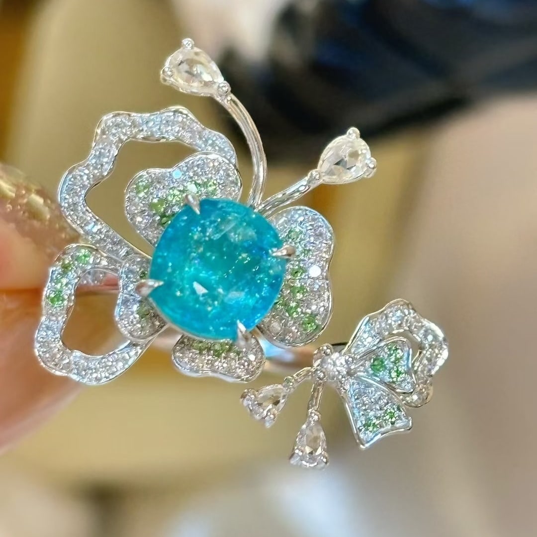 14k Gold 1.38 Ct Natural Paraiba Tourmaline & Diamond & Sapphire & Tsavorite Ring: Ref:231040386 // gold content:14k gold // ring size:7. 25us // // main gemstone:paraiba tourmaline // shape:cushion // carat weight:1. 38ct // color:blue // treatment:natural // // adjacent gemstone