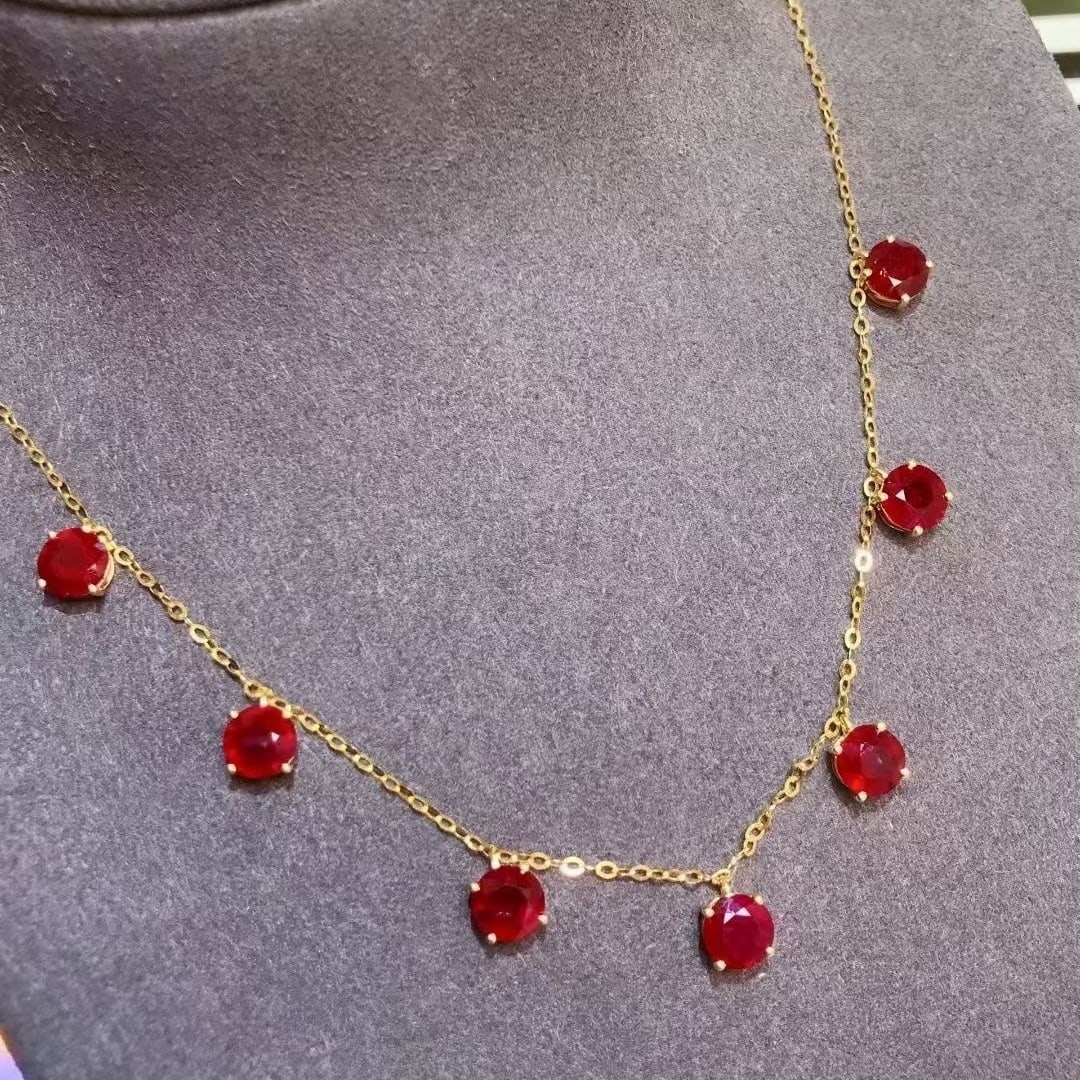 14k Gold 6.2 Ct Natural Ruby Necklace: Ref:231040400 // gold content:14k gold // main gemstone:ruby // shape:round // carat weight:6. 2ct // color:pigeonblood red // treatment:natural // cut grade:g // Condition: New Low Estimate: 6700 Hig