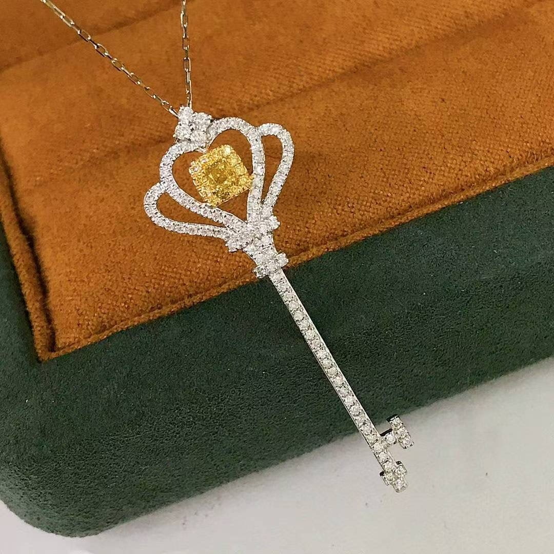 14k Gold 0.62 Ct Natural Color Diamond Pendant( Without Chain ): Ref:231040414 // gold content:14k gold // main gemstone:diamond // shape:multiply // carat weight:0. 62ct // clarity grade:vs-si // color:color // treatment:natural // Low Estimate: 3400 High