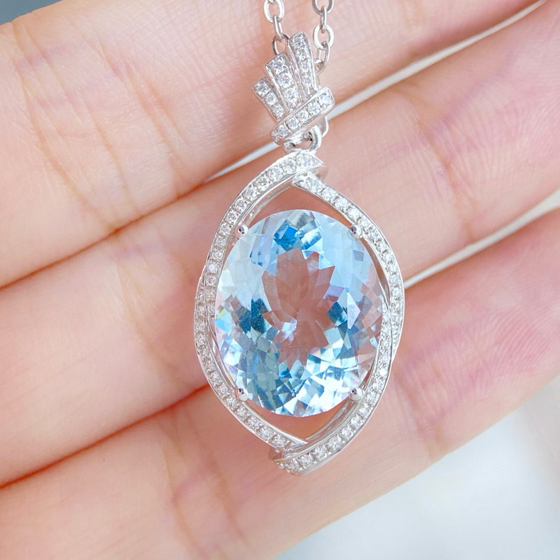 14k Gold 7.76 Ctw Natural Aquamarine & Diamond Pendant( Without Chain ): Ref:231040422 // gold content:14k gold // main gemstone:aquamarine // shape:oval // carat weight:7. 49ct // color:blue // treatment:natural // // adjacent gemstone 2 : diamond // shape:round // carat 