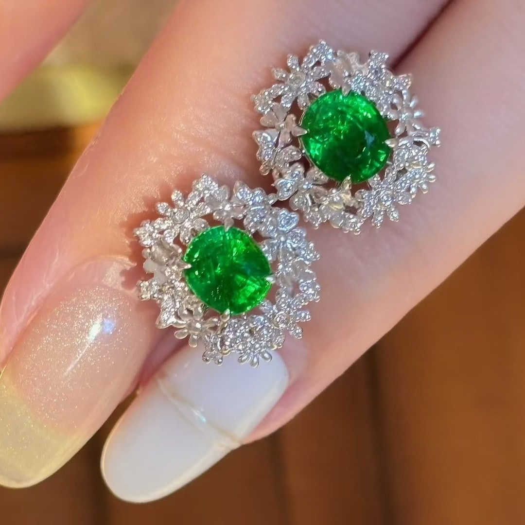 14k Gold 2.32 Ct Vivid Green Natural Tsavorite & Diamond Earrings: Ref:231040424 // gold content:14k gold // main gemstone:tsavorite // shape:oval // carat weight:2. 32ct // color:vivid green // treatment:natural // // adjacent gemstone 2 : diamond // shape:round //