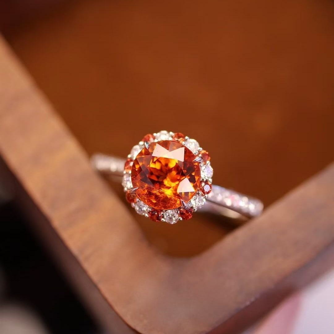 14k Gold 1.55 Ctw Natural Spessartine & Diamond Ring: Ref:231040426 // gold content:14k gold // ring size:7. 25us // // main gemstone:spessartine // shape:round // carat weight:1. 4ct // color:orange // treatment:natural // cut grade:g // // adjacent