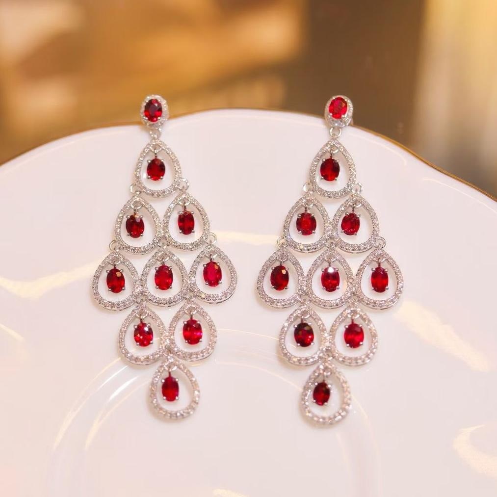 14k Gold 6.12 Ct Natural Ruby & Diamond Earrings: Ref:231043004 // gold content:14k gold // main gemstone:ruby // shape:oval // carat weight:6. 12ct // color:pigeonblood red // treatment:natural // // adjacent gemstone 2 : diamond // number of