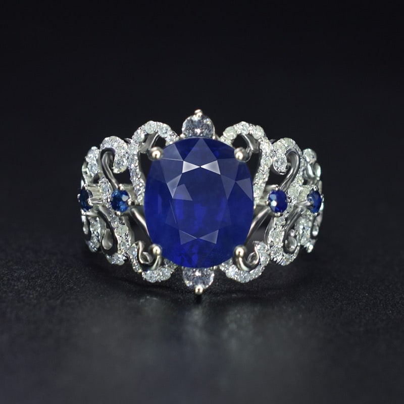 14k Gold 3.37 Ctw Natural Sapphire & Diamond Ring: Ref:231043005 // gold content:14k gold // ring size:7. 25us // // main gemstone:sapphire // shape:oval // carat weight:3. 13ct // color:royal blue // treatment:natural // // adjacent gemstone 2 : diam