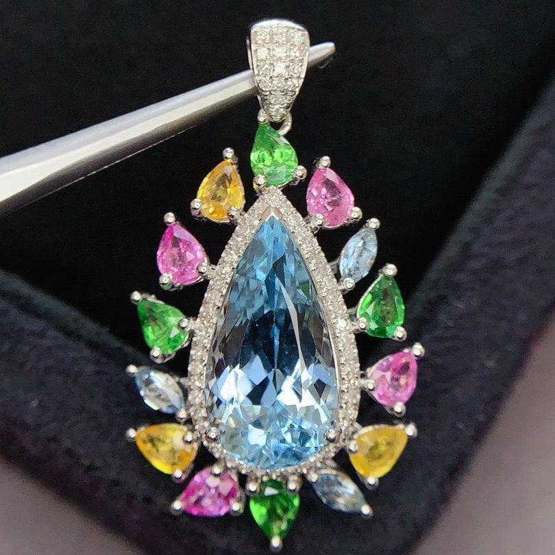 14k Gold 5.3 Ct Natural Aquamarine & Diamond Pendant( Without Chain ): Ref:231043015 // gold content:14k gold // main gemstone:aquamarine // shape:pear // carat weight:5. 3ct // color:blue // treatment:natural // // adjacent gemstone 2 : diamond // shape:round //