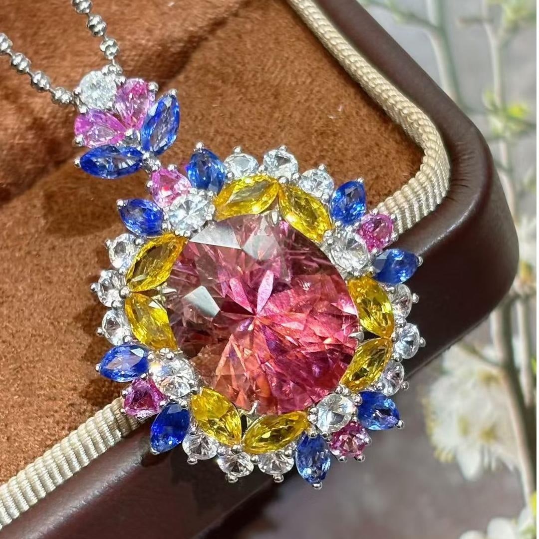 14k Gold 10.88 Ct Natural Tourmaline & Diamond & Sapphire Pendant( Without Chain ): Ref:231043016 // gold content:14k gold // main gemstone:tourmaline // shape:oval // carat weight:10. 88ct // color:pink // treatment:natural // // adjacent gemstone 2 : diamond // shape:round // clari