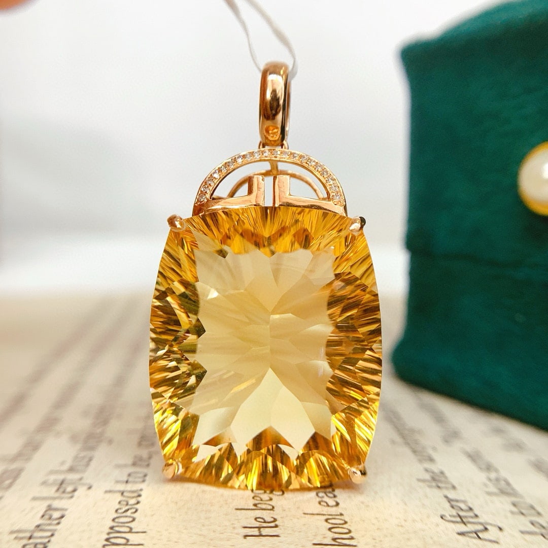 14k Gold 38.8 Ct Natural Citrine & Diamond Pendant( Without Chain ): Ref:231043019 // gold content:14k gold // main gemstone:citrine // shape:cushion // carat weight:38. 8ct // color:yellow // treatment:natural // // adjacent gemstone 2 : diamond // number of