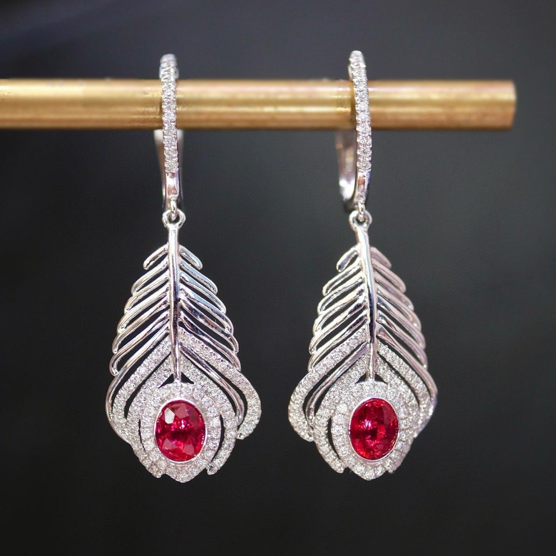 14k Gold 0.75 Ct Natural Ruby & Diamond Earrings: Ref:231043027 // gold content:14k gold // main gemstone:ruby // shape:oval // carat weight:0. 75ct // color:pigeonblood red // treatment:natural // // adjacent gemstone 2 : diamond // shape:round //