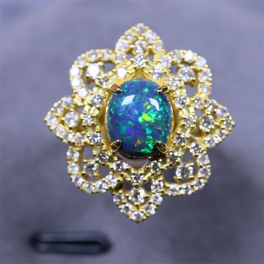 14k Gold 1.7 Ctw Natural Opal & Diamond Ring: Ref:231043040 // gold content:14k gold // ring size:7. 25us // // main gemstone:opal // shape:oval // carat weight:1ct // color:color // treatment:natural // // adjacent gemstone 2 : diamond //