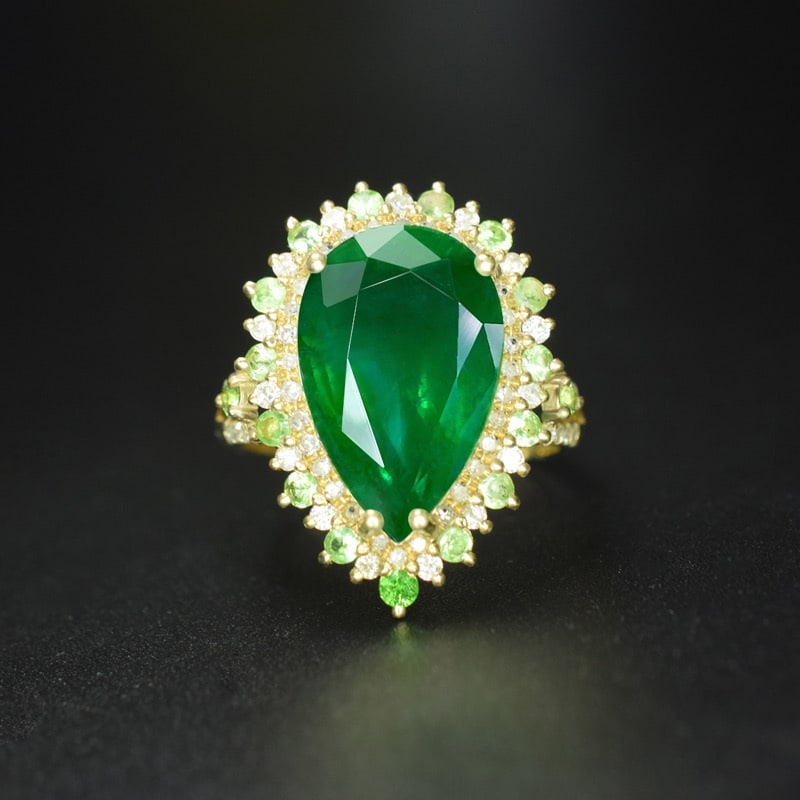 14k Gold 5.49 Ctw Vivid Green Natural Emerald & Diamond Ring: Ref:231043063 // gold content:14k gold // ring size:7. 25us // // main gemstone:emerald // shape:pear // carat weight:5. 08ct // color:vivid green // treatment:natural // // adjacent gemstone 2 :