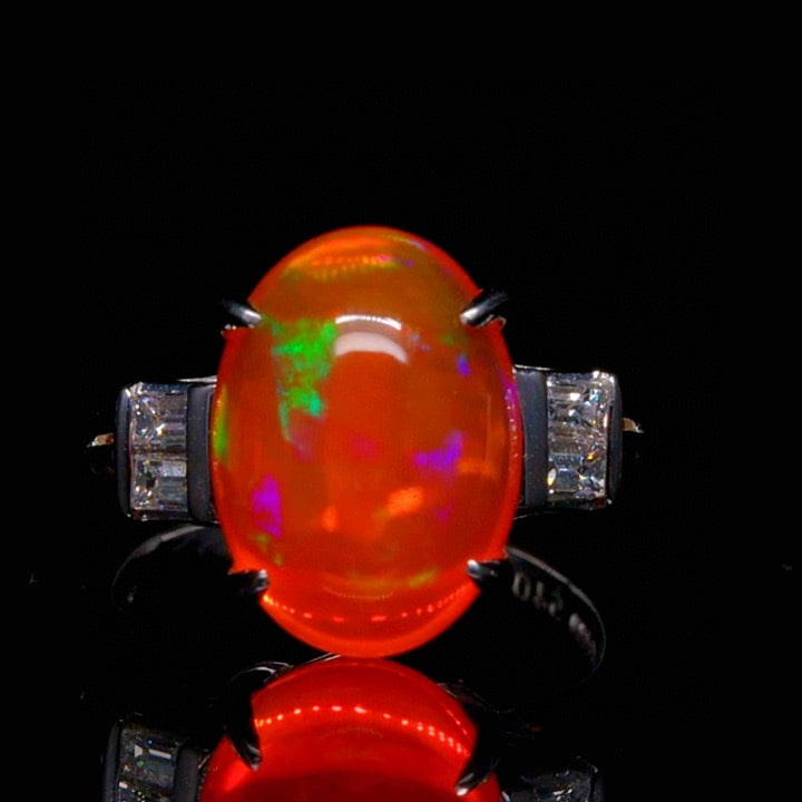 14k Gold 5.64 Ctw Natural Opal & Diamond Ring: Ref:231043115 // gold content:14k gold // ring size:7. 25us // // main gemstone:opal // shape:oval // carat weight:5. 4ct // color:orange // treatment:natural // // adjacent gemstone 2 : diamond //
