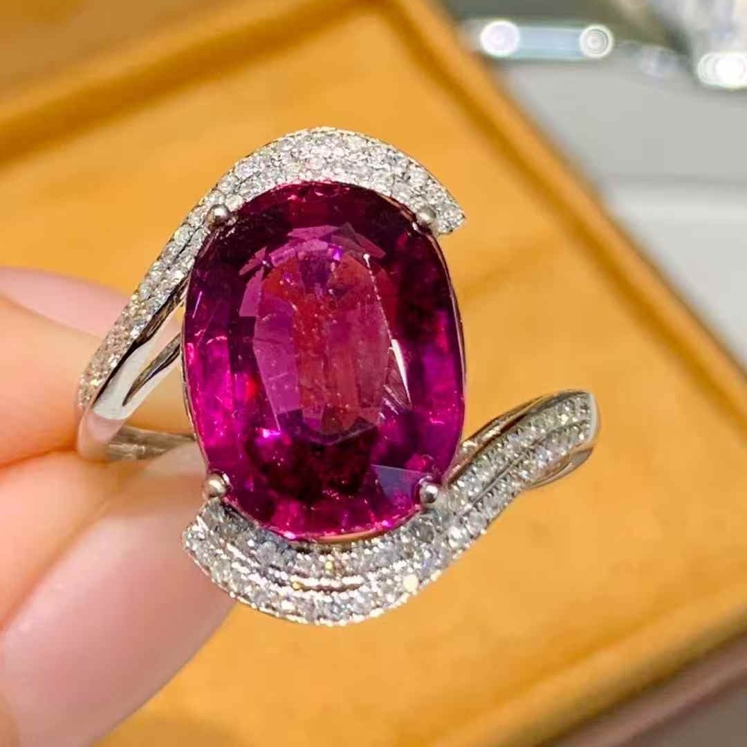 14k Gold 5 Ct Natural Tourmaline & Diamond Ring: Ref:231043125 // gold content:14k gold // ring size:7. 25us // // main gemstone:tourmaline // shape:oval // carat weight:5ct // color:red // treatment:natural // // adjacent gemstone 2 : diamond //
