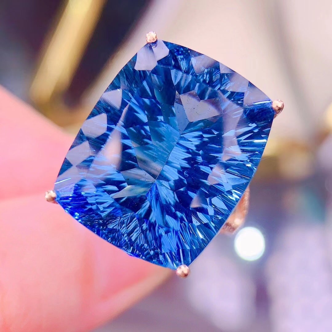 14k Gold 32 Ct Natural Topaz & Diamond Ring: Ref:231043146 // gold content:14k gold // ring size:7. 25us // // main gemstone:topaz // shape:cushion // carat weight:32ct // color:blue // treatment:natural // // adjacent gemstone 2 : diamond //