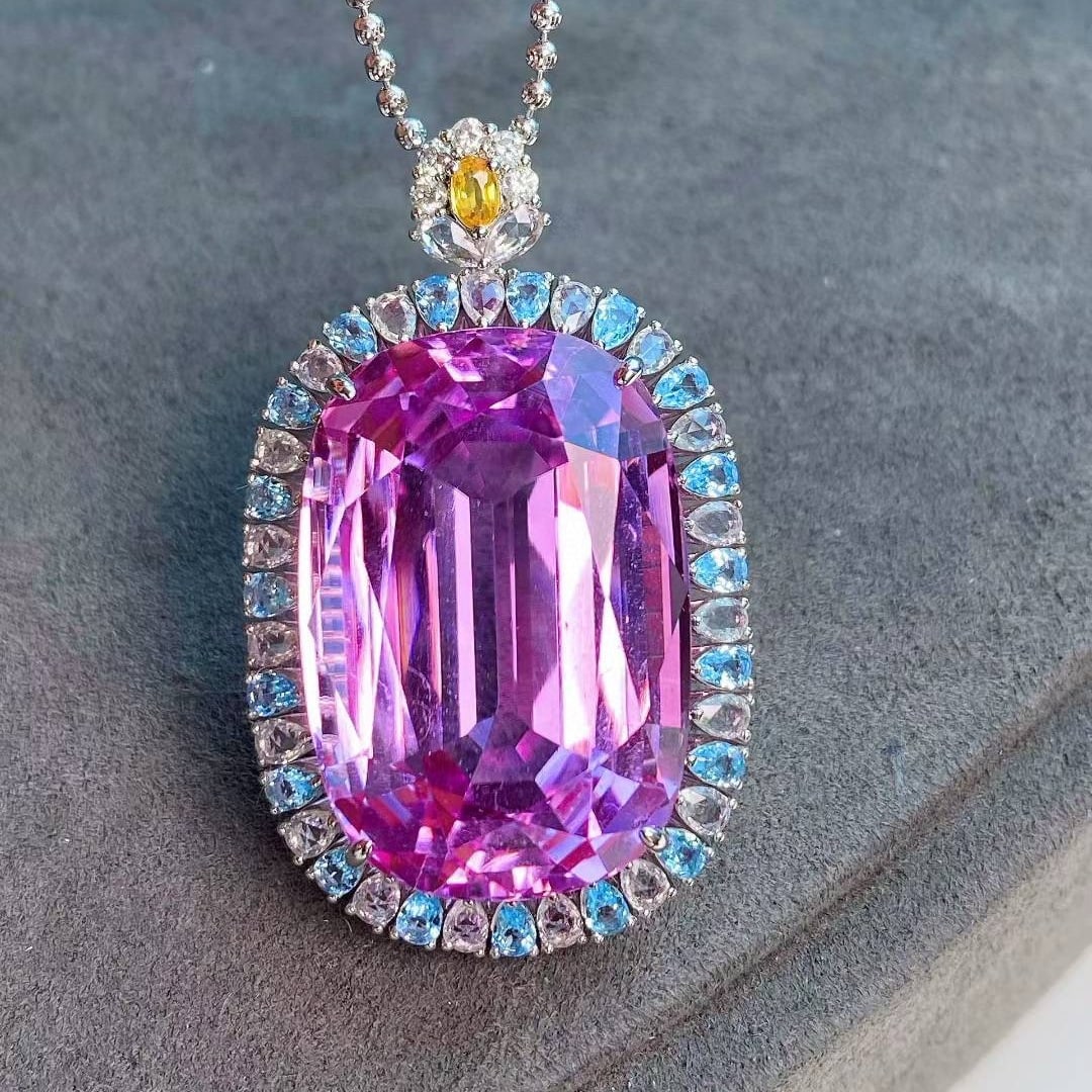 14k Gold 50.05 Ctw Natural Kunzite & Sapphire Pendant( Without Chain ): Ref:231043148 // gold content:14k gold // main gemstone:kunzite // shape:cushion // carat weight:48. 6ct // color:purple // treatment:natural // // adjacent gemstone 2 : sapphire // shape:pear // cara