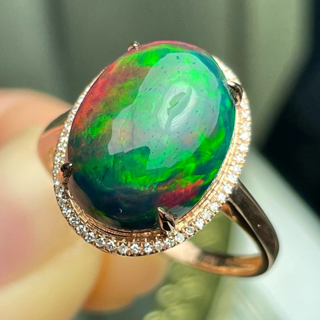 14k Gold 4.55 Ct Natural Opal & Diamond Ring: Ref:231043162 // gold content:14k gold // ring size:7. 25us // // main gemstone:opal // shape:oval // carat weight:4. 55ct // color:color // treatment:natural // // adjacent gemstone 2 : diamond //