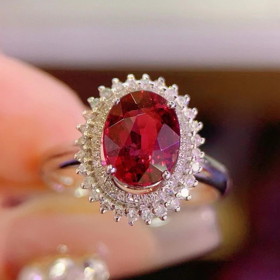 14k Gold 2.2 Ct Natural Tourmaline & Diamond Ring: Ref:231043164 // gold content:14k gold // ring size:7. 25us // // main gemstone:tourmaline // shape:oval // carat weight:2. 2ct // color:red // treatment:natural // // adjacent gemstone 2 : diamond //