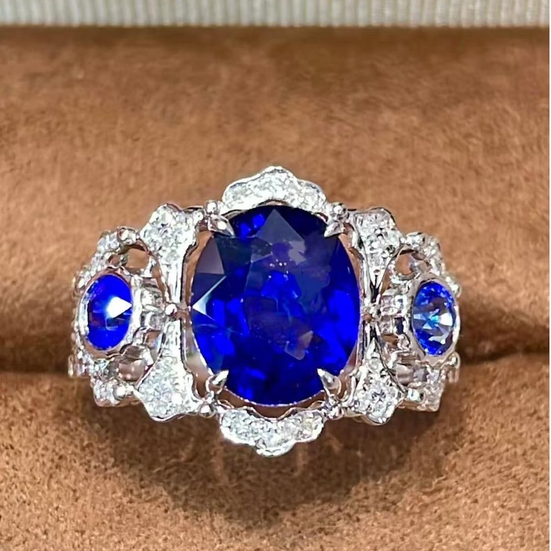 14k Gold 2.71 Ct Natural Sapphire & Diamond Ring: Ref:231043177 // gold content:14k gold // ring size:7. 25us // // main gemstone:sapphire // shape:oval // carat weight:2. 71ct // color:royal blue // treatment:natural // // adjacent gemstone 2 : diam