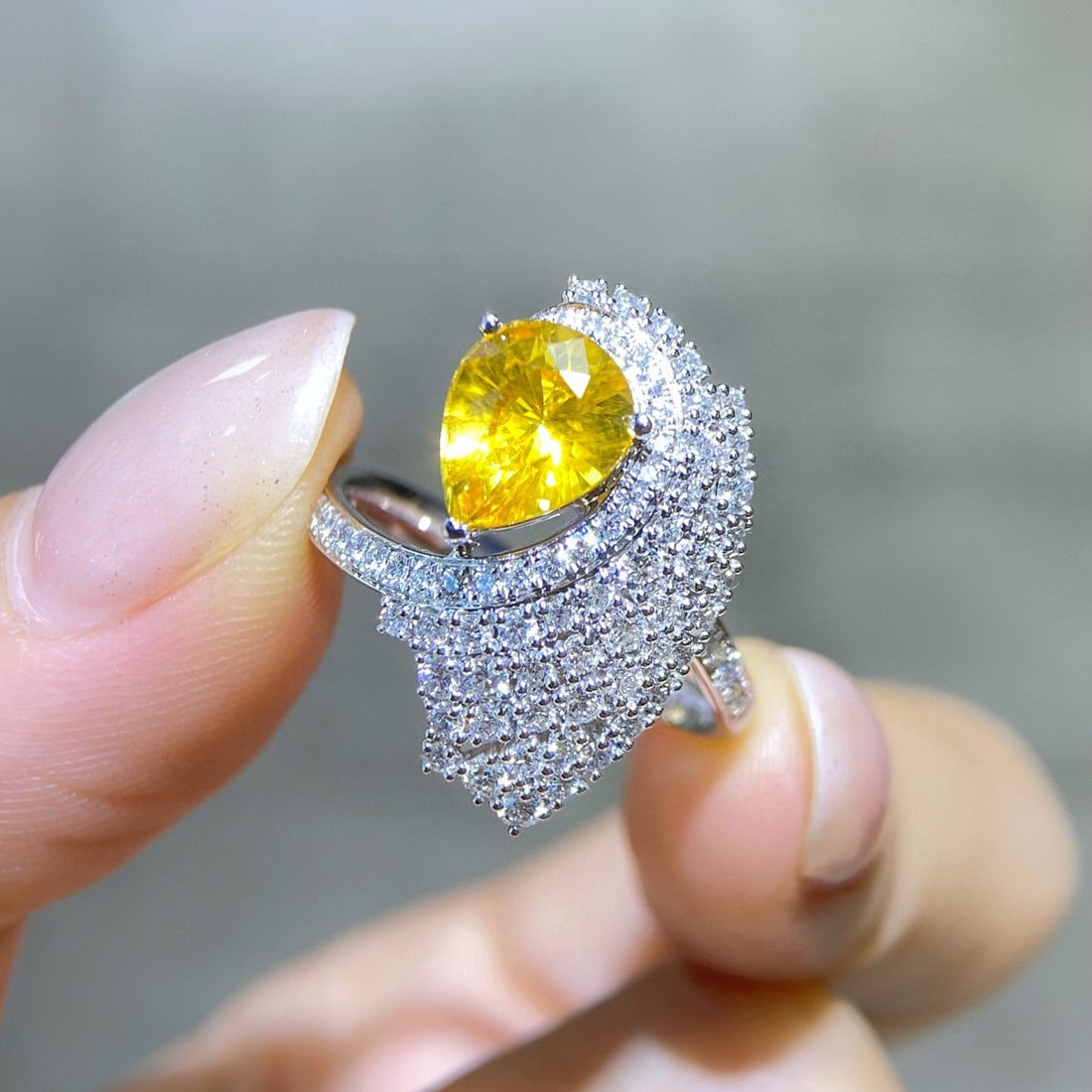 14k Gold 2.77 Ctw Natural Sapphire & Diamond Ring: Ref:231043180 // gold content:14k gold // ring size:7. 25us // // main gemstone:sapphire // shape:pear // carat weight:2. 02ct // color:yellow // treatment:natural // // adjacent gemstone 2 : diamond