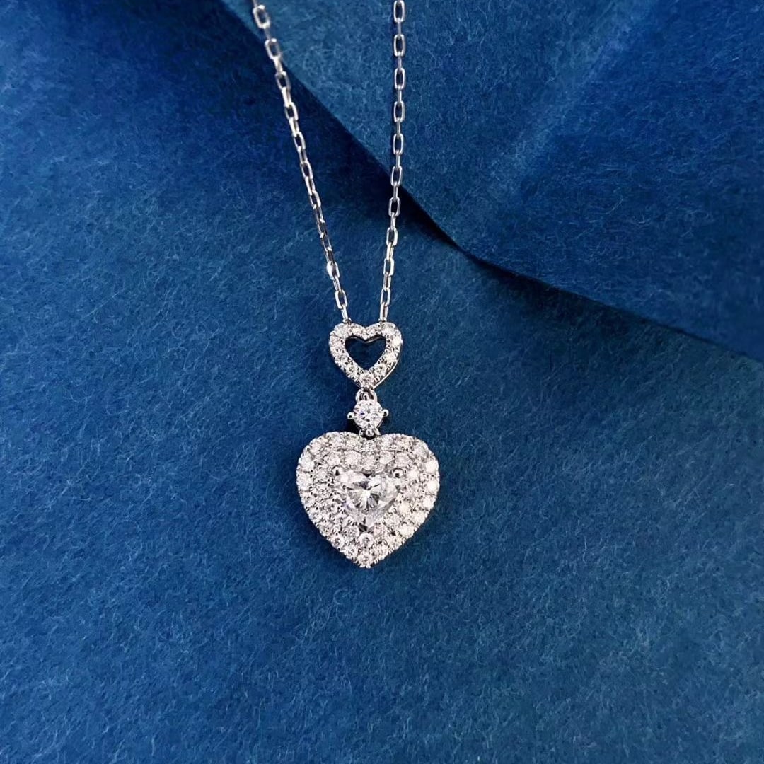 Gia Certified 14k Gold 0.61 Ctw Natural E Si1 Heart Diamond Necklace: Ref:231043192 // gold content:14k gold // main gemstone:diamond // certified:gia // shape:heart // carat weight:0. 31ct // clarity grade:si1 // color:e // treatment:natural // // adjacent gemstone 2 :