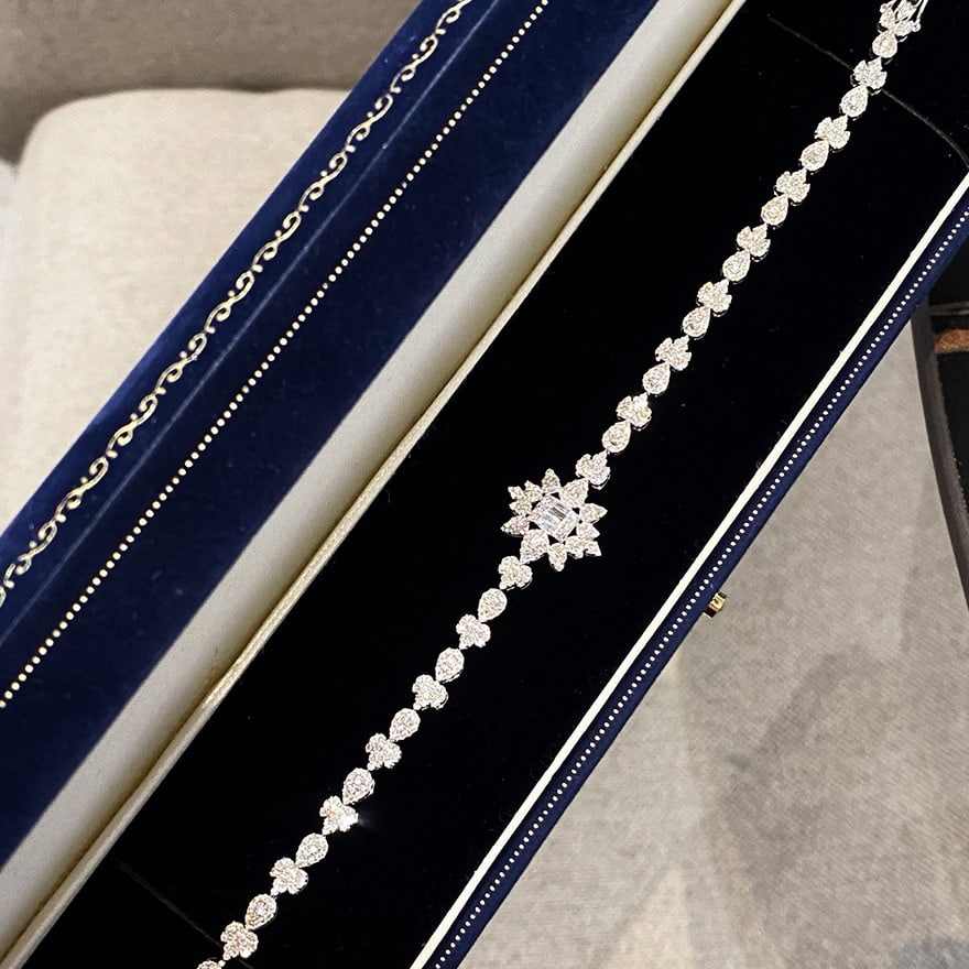 14k Gold 2 Ct Natural H Diamond Bracelet: Ref:231043197 // gold content:14k gold // main gemstone:diamond // shape:multiply // carat weight:2ct // clarity grade:vs-si // color:h // treatment:natural // Condition: New Low Estimate: 7500.00