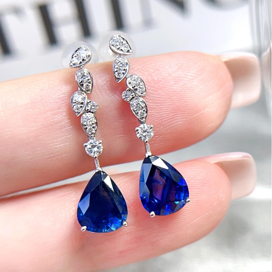 14k Gold 3.31 Ctw Natural Sapphire & Diamond Earrings: Ref:231043224 // gold content:14k gold // main gemstone:sapphire // shape:pear // carat weight:3. 07ct // color:royal blue // treatment:natural // // adjacent gemstone 2 : diamond // shape:round // ca