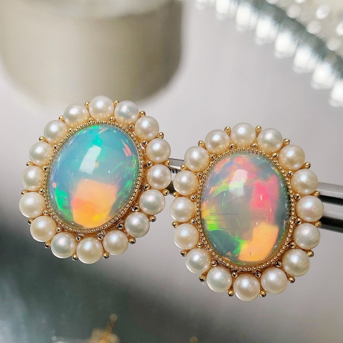 14k Gold 6.57 Ct Natural Opal & Pearl Earrings: Ref:231043251 // gold content:14k gold // main gemstone:opal // shape:oval // carat weight:6. 57ct // color:color // treatment:natural // // adjacent gemstone 2 : pearl // shape:round // color:white