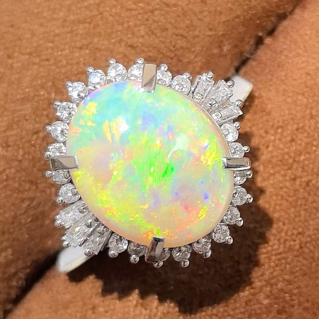14k Gold 6.72 Ctw Natural Opal & Diamond Ring: Ref:231044038 // gold content:14k gold // ring size:7. 25us // // main gemstone:opal // shape:oval // carat weight:6. 13ct // color:color // treatment:natural // // adjacent gemstone 2 : diamond // sh