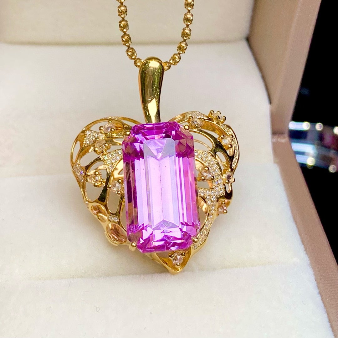 14k Gold 21.3 Ct Natural Kunzite & Diamond & Sapphire Pendant( Without Chain ): Ref:231044061 // gold content:14k gold // main gemstone:kunzite // shape:octagonal // carat weight:21. 3ct // color:purple // treatment:natural // // adjacent gemstone 2 : diamond // shape:round //