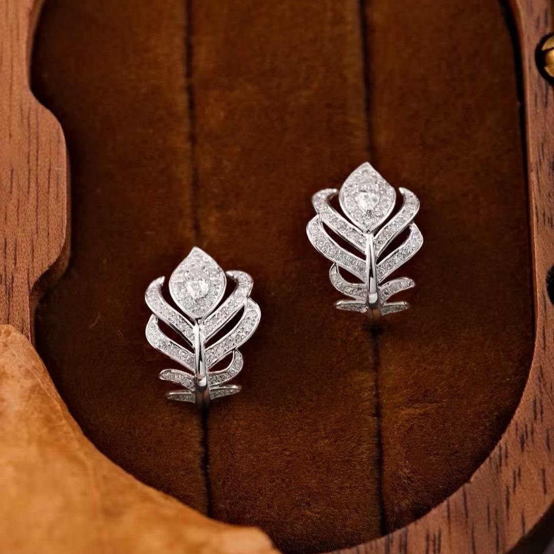 14k Gold 0.32 Ct Natural H Diamond Earrings: Ref:231044069 // gold content:14k gold // main gemstone:diamond // shape:multiply // carat weight:0. 32ct // clarity grade:vs-si // color:h // treatment:natural // Condition: New Low Estimate: 2100.00
