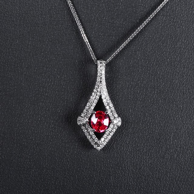 14k Gold 0.91 Ctw Natural Ruby & Diamond Pendant( Without Chain ): Ref:231044095 // gold content:14k gold // main gemstone:ruby // shape:oval // carat weight:0. 65ct // color:red // treatment:natural // // adjacent gemstone 2 : diamond // number of stones:87 // shape