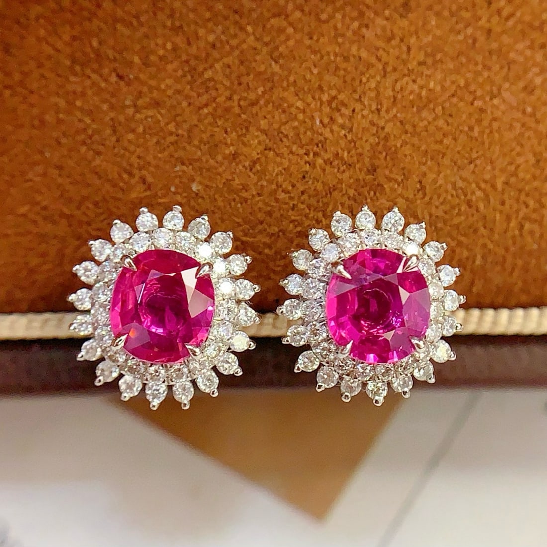 14k Gold 1.6 Ct Natural Ruby & Diamond Earrings: Ref:231044131 // gold content:14k gold // main gemstone:ruby // shape:oval // carat weight:1. 6ct // color:red // treatment:natural // // adjacent gemstone 2 : diamond // number of stones:78 // shape: