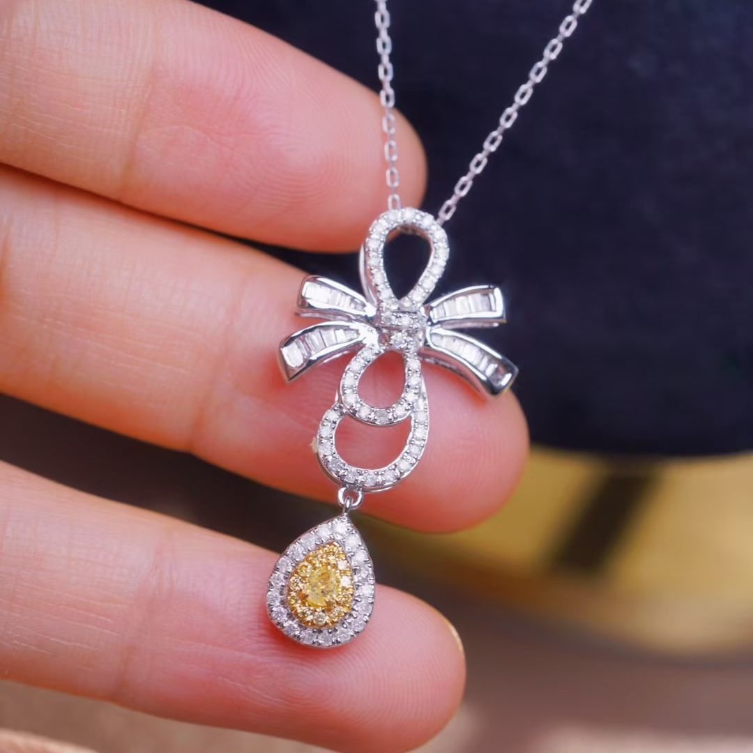 14k Gold 0.65 Ctw Natural Yellow Diamond & Diamond Necklace: Ref:231044163 // gold content:14k gold // main gemstone:yellow diamond // shape:pear // carat weight:0. 08ct // color:yellow // treatment:natural // // adjacent gemstone 2 : diamond // shape:multiply