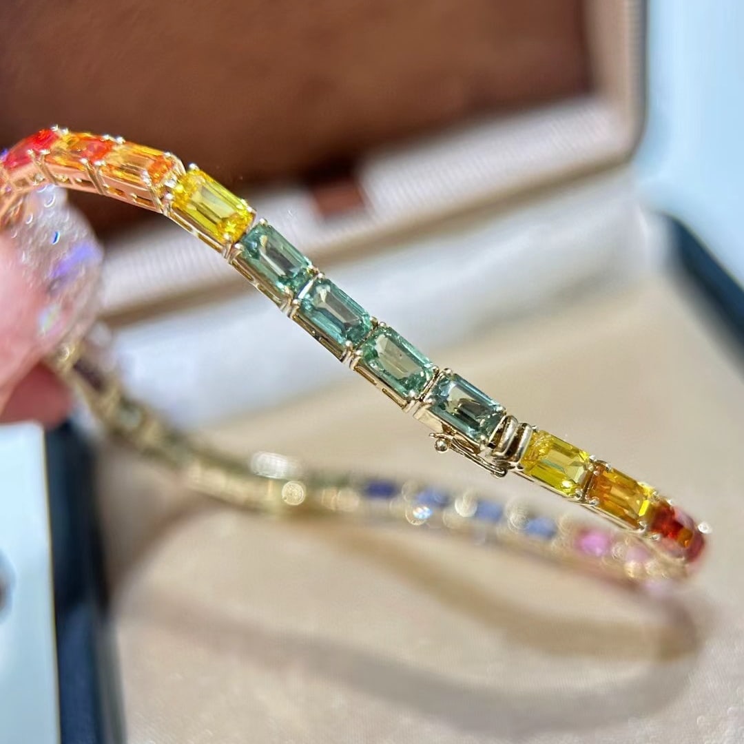 14k Gold 11.85 Ct Natural Sapphire Bracelet: Ref:231044177 // gold content:14k gold // main gemstone:sapphire // shape:octagonal // carat weight:11. 85ct // color:color // treatment:natural // Condition: New Low Estimate: 6200.00 High Estimate: