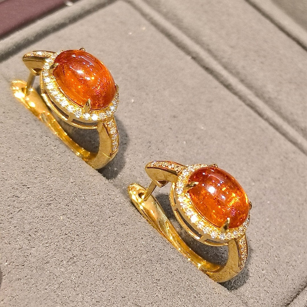 14k Gold 5.05 Ctw Natural Spessartine & Diamond Earrings: Ref:231044208 // gold content:14k gold // main gemstone:spessartine // shape:oval // carat weight:4. 85ct // color:orange // treatment:natural // // adjacent gemstone 2 : diamond // shape:round // car