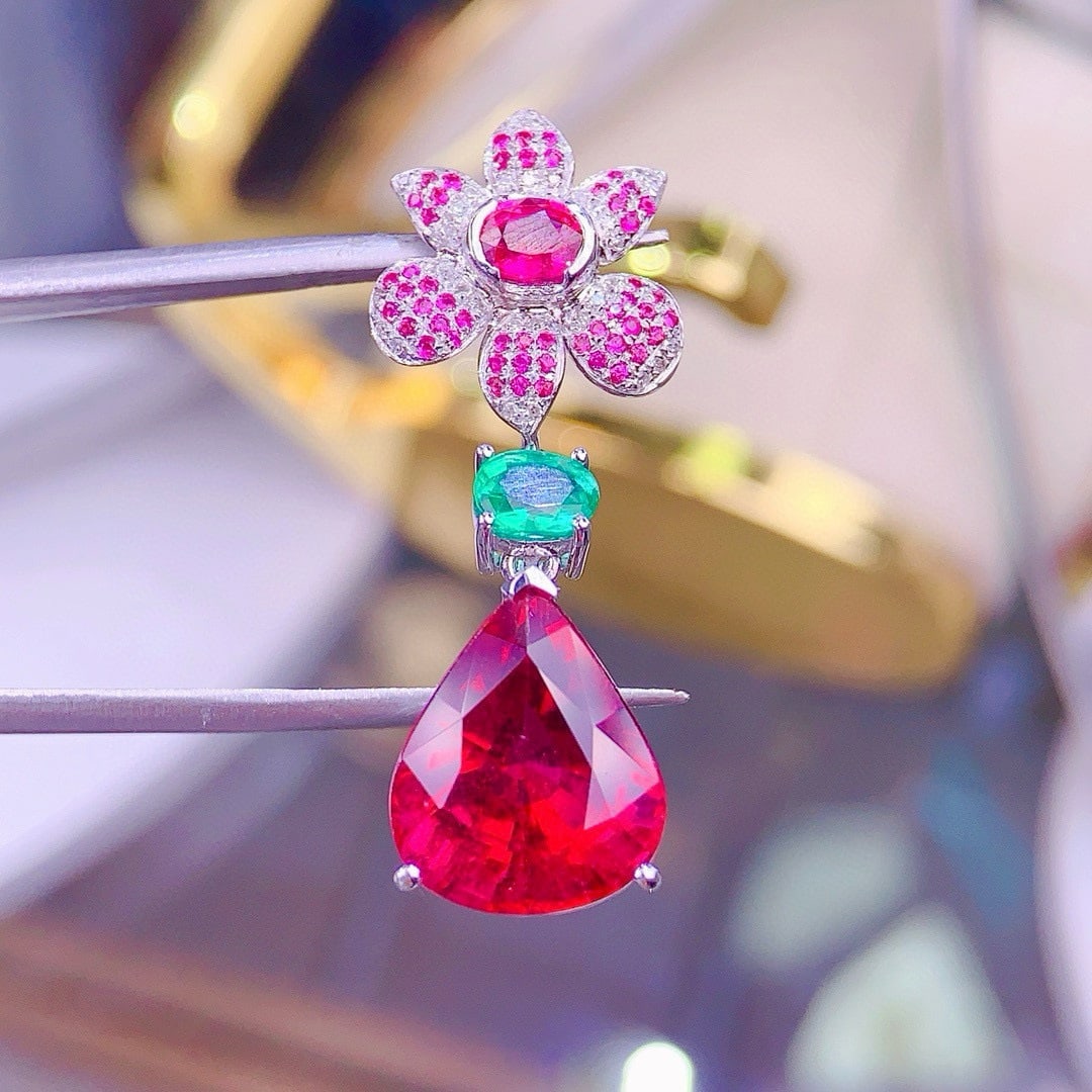 14k Gold 7.9 Ct Natural Tourmaline & Ruby & Emerald & Diamond Pendant( Without Chain ): Ref:231044210 // gold content:14k gold // main gemstone:tourmaline // shape:pear // carat weight:7. 9ct // color:red // treatment:natural // // adjacent gemstone 2 : ruby // shape:multiply // color:re