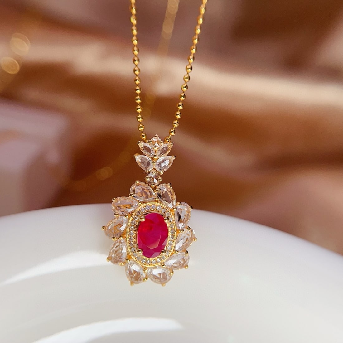 14k Gold 0.82 Ct Natural Ruby & Diamond & Sapphire Pendant( Without Chain ): Ref:231044274 // gold content:14k gold // main gemstone:ruby // shape:oval // carat weight:0. 82ct // color:red // treatment:natural // // adjacent gemstone 2 : diamond // number of stones:28 //