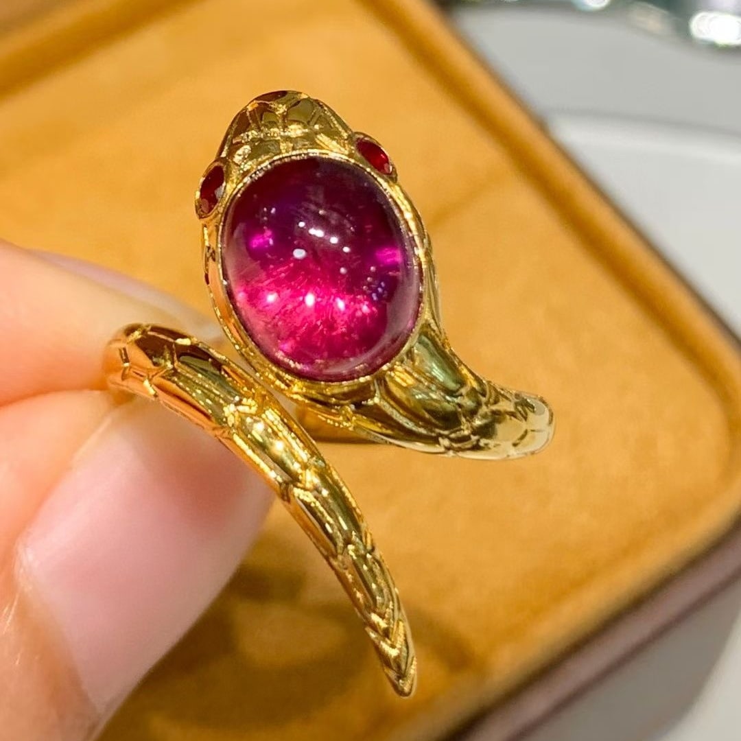 14k Gold 3.3 Ct Natural Tourmaline & Ruby Ring: Ref:231044291 // gold content:14k gold // ring size:7. 25us // // main gemstone:tourmaline // shape:oval // carat weight:3. 3ct // color:red // treatment:natural // // adjacent gemstone 2 : ruby // sh