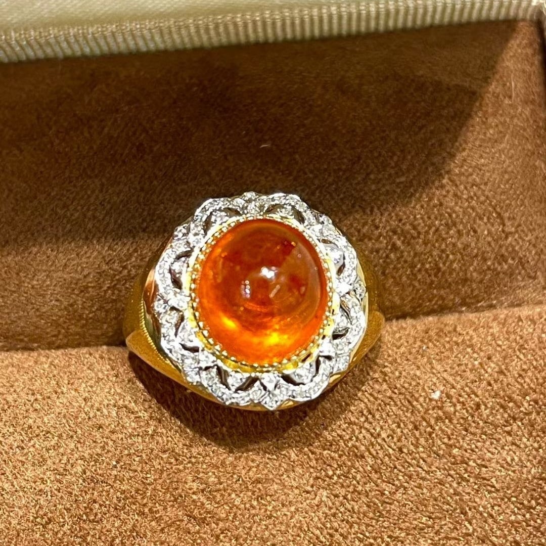 14k Gold 7.7 Ct Natural Spessartine & Diamond Ring: Ref:231044294 // gold content:14k gold // ring size:7. 25us // // main gemstone:spessartine // shape:oval // carat weight:7. 7ct // color:orange // treatment:natural // // adjacent gemstone 2 :
