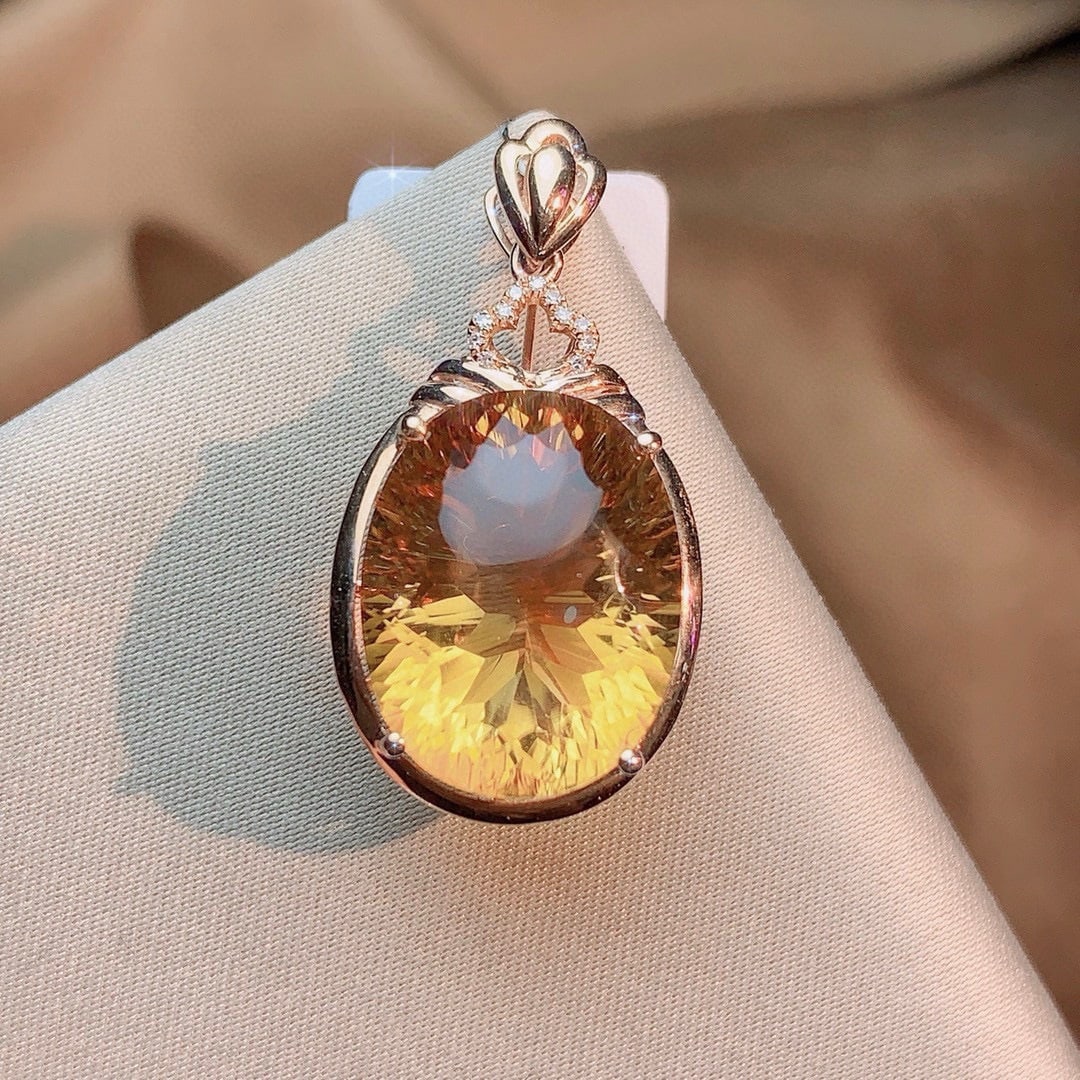 14k Gold 12.93 Ctw Natural Citrine & Diamond Pendant( Without Chain ): Ref:231044296 // gold content:14k gold // main gemstone:citrine // shape:oval // carat weight:12. 9ct // color:yellow // treatment:natural // // adjacent gemstone 2 : diamond // number of stones:11