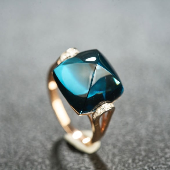 14k Gold 15.2 Ct Natural Topaz & Diamond Ring: Ref:231044325 // gold content:14k gold // ring size:7. 25us // // main gemstone:topaz // shape:suger-loaf // carat weight:15. 2ct // color:blue // treatment:natural // // adjacent gemstone 2 :